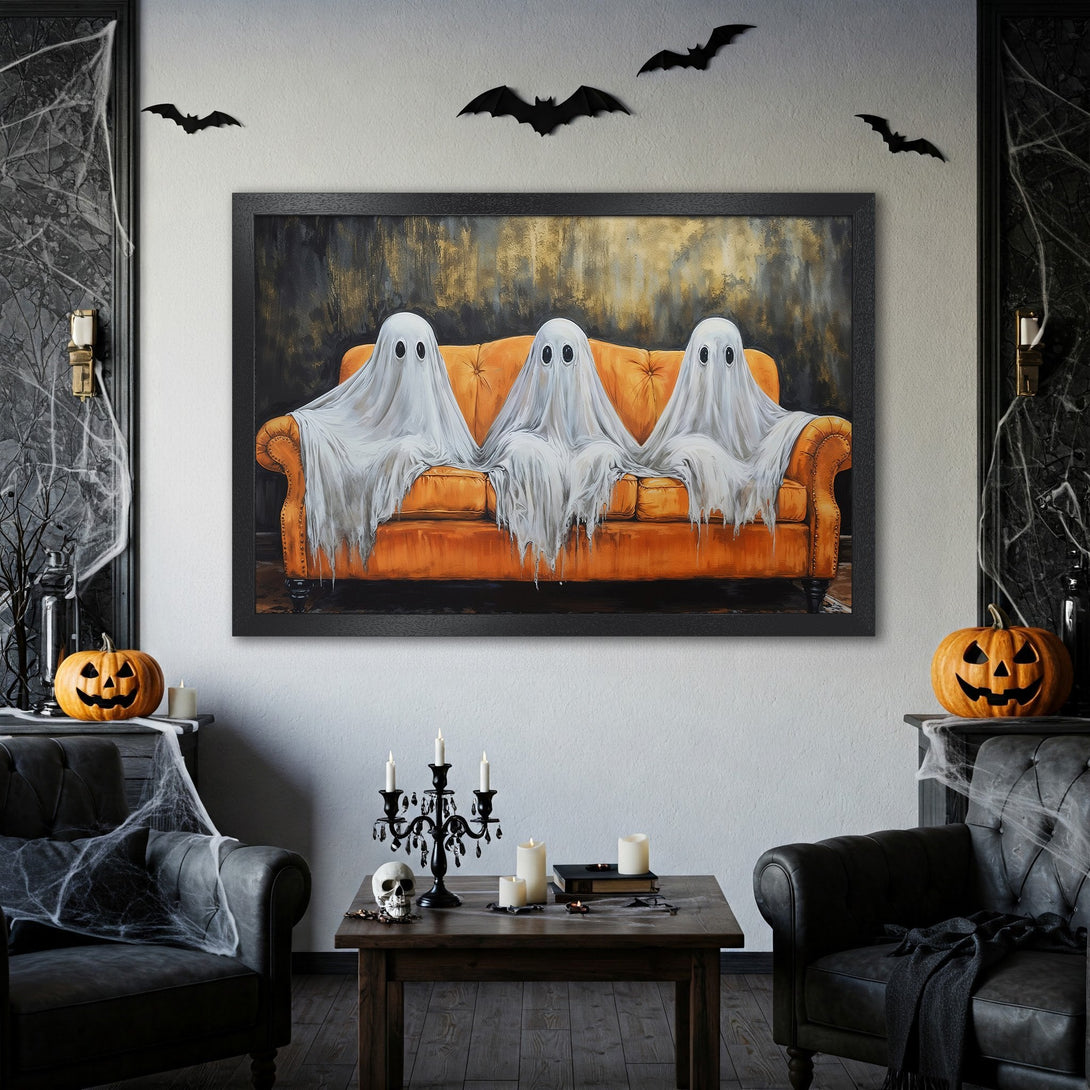 Framed Poster featuring spooky ghosts on a couch. Halloween art print in a black frame. Orange, black, and white color palette. Perfect Halloween decor.