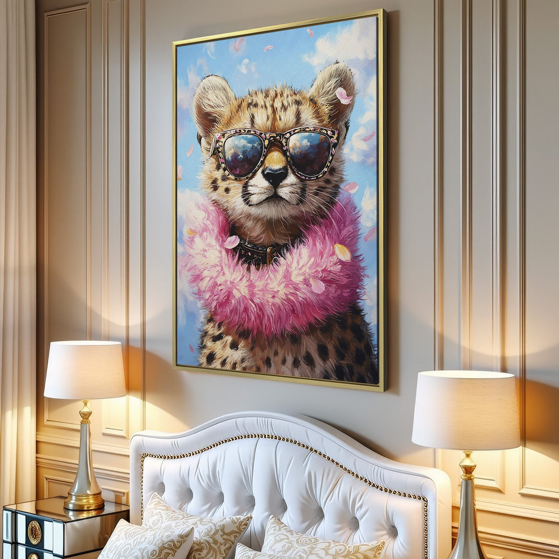 Canvas Print of a cool cheetah wearing sunglasses and a pink boa, displayed in a modern living room. Playful art with a blue, pink, and neutral color palette.