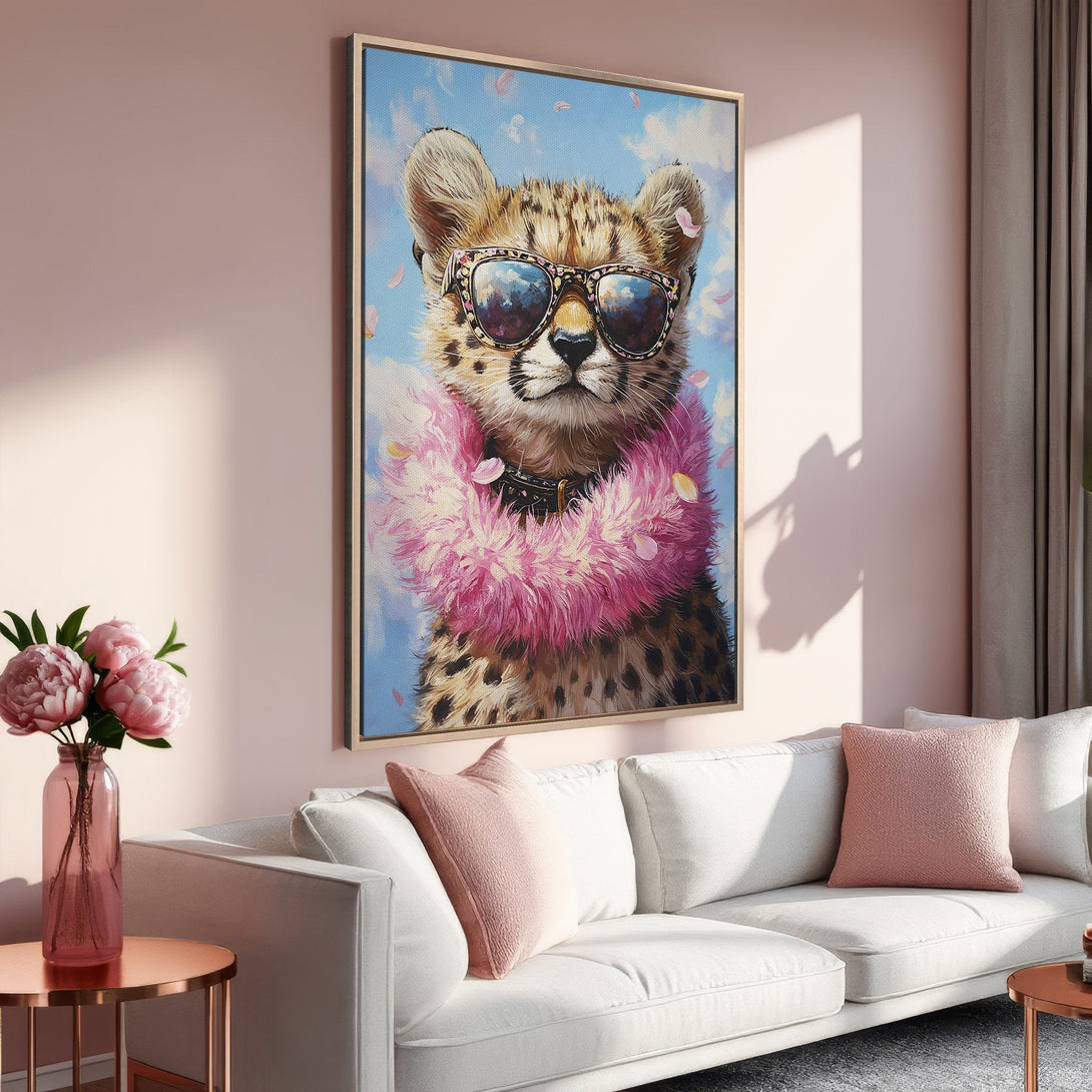 Framed Wall Art featuring a cheetah wearing sunglasses and a pink boa. Stylish art in a soft pink and blue color palette, perfect for home decor.