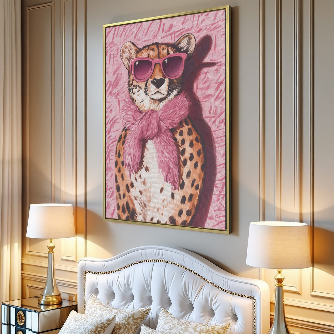 Canvas Print of a stylish cheetah wearing sunglasses and a pink scarf, set in a modern interior with a pink and brown color palette.