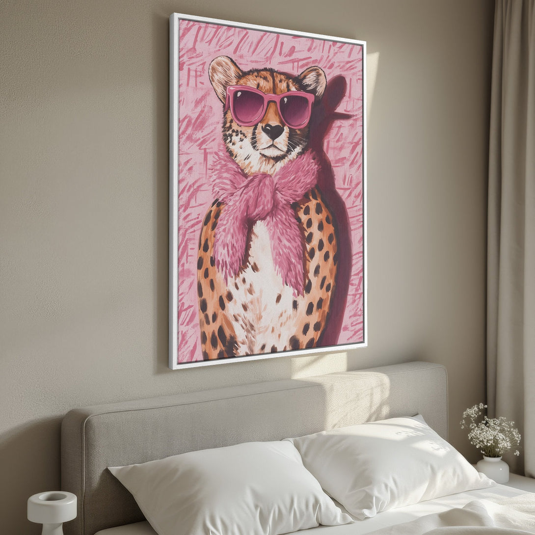 Framed Wall Art featuring a stylish cheetah in pink sunglasses and scarf. Modern, whimsical art with a pink, brown, and white color palette. Perfect bedroom decor.