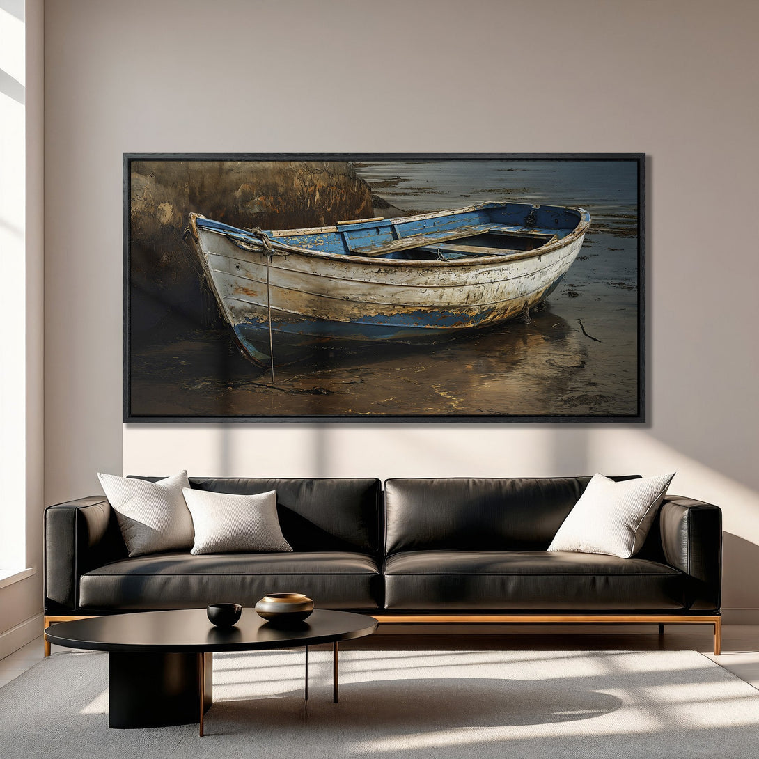 Framed Wall Art Canvas Print of a weathered boat on a beach, showcasing a coastal aesthetic with blue, white, and brown tones. Perfect for adding a touch of serenity.