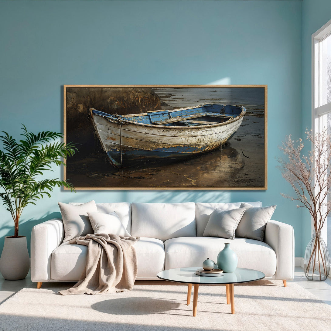 Framed Wall Art: Coastal boat art in blue and brown tones. Perfect for adding a touch of nautical charm to your living room.