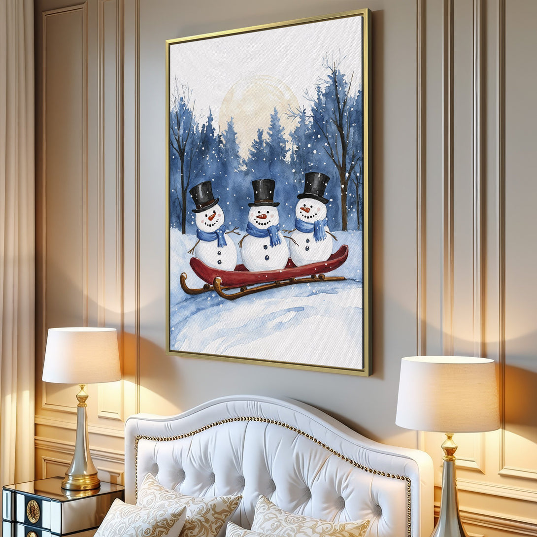 Canvas Print featuring a whimsical watercolor scene of snowmen on a sled, with a blue and white winter palette. Perfect for holiday decor!