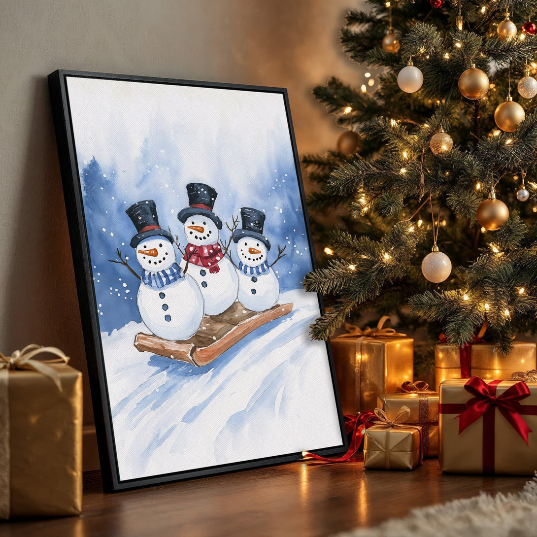 Framed Wall Art: Watercolor snowman print in blue and white, perfect for holiday decor. Festive winter art with a Christmas tree and gifts.
