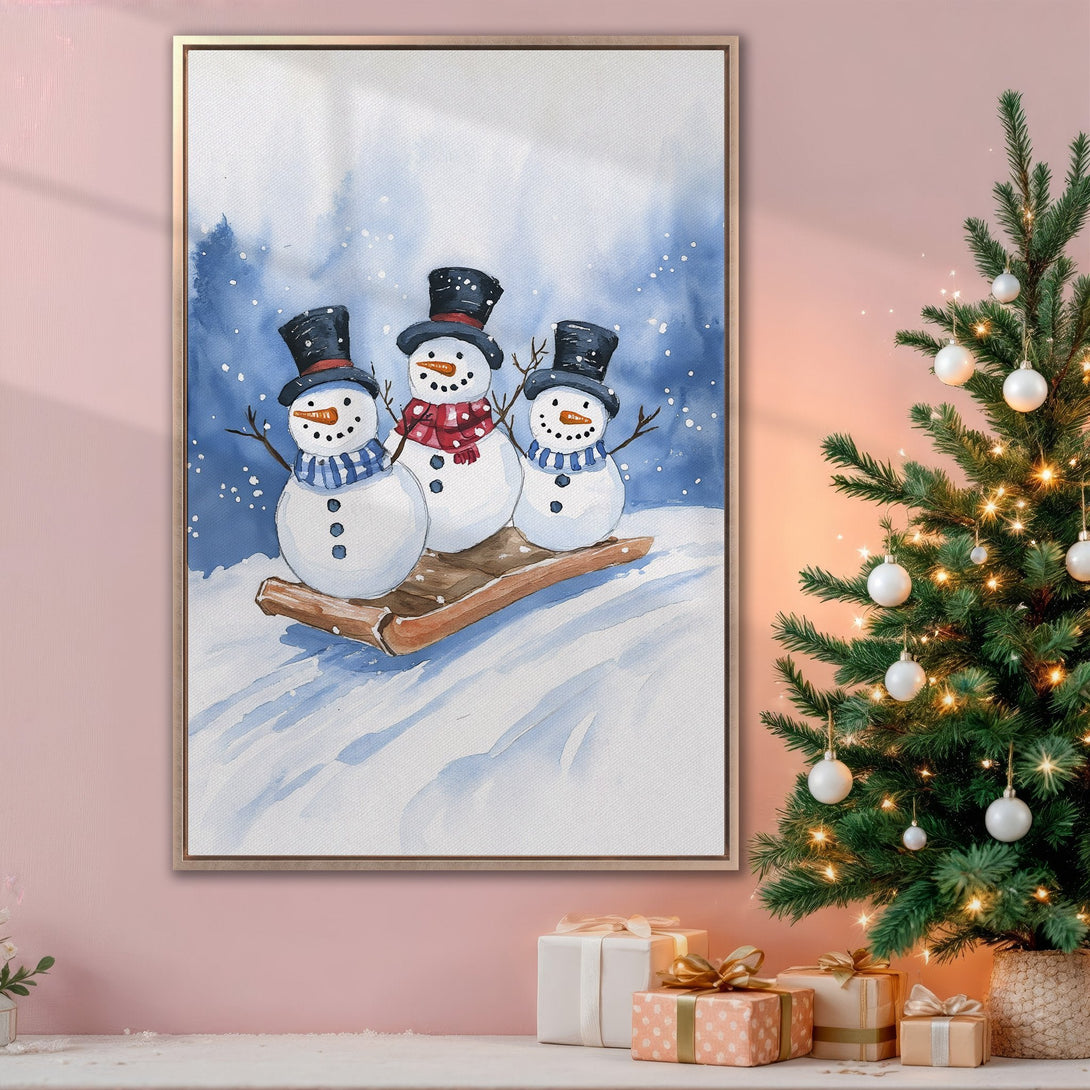 Framed Wall Art featuring a watercolor snowman scene in blue and white. Perfect Christmas decor for a cozy, winter-themed home.