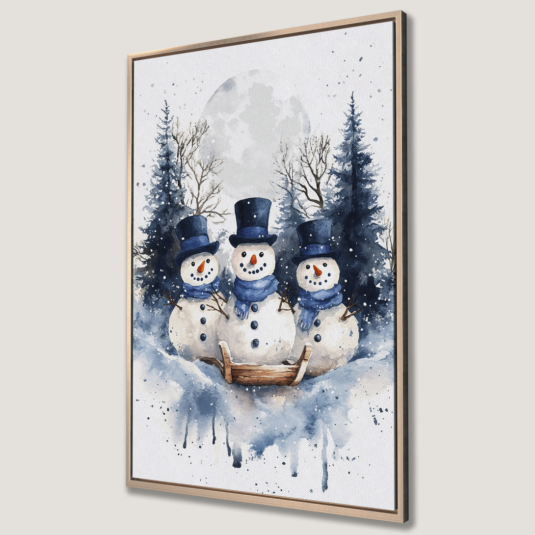 Framed Wall Art featuring a watercolor winter scene with snowmen, trees, and a moon. Blue and white color palette, perfect for holiday decor.