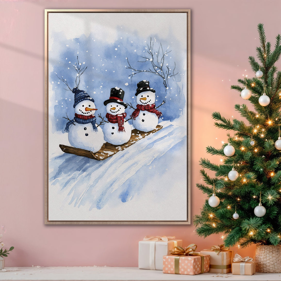 Framed Wall Art featuring watercolor snowmen in a winter scene. Charming blue and white palette, perfect for holiday decor. Add festive cheer to your home!