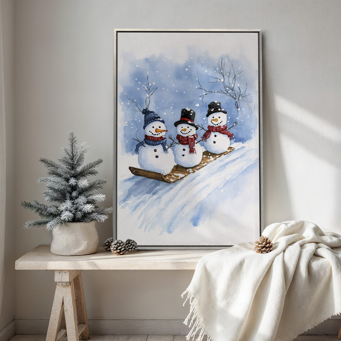 Framed Wall Art: Watercolor painting of snowmen in a winter scene. Blue and white color palette. Perfect for holiday decor!