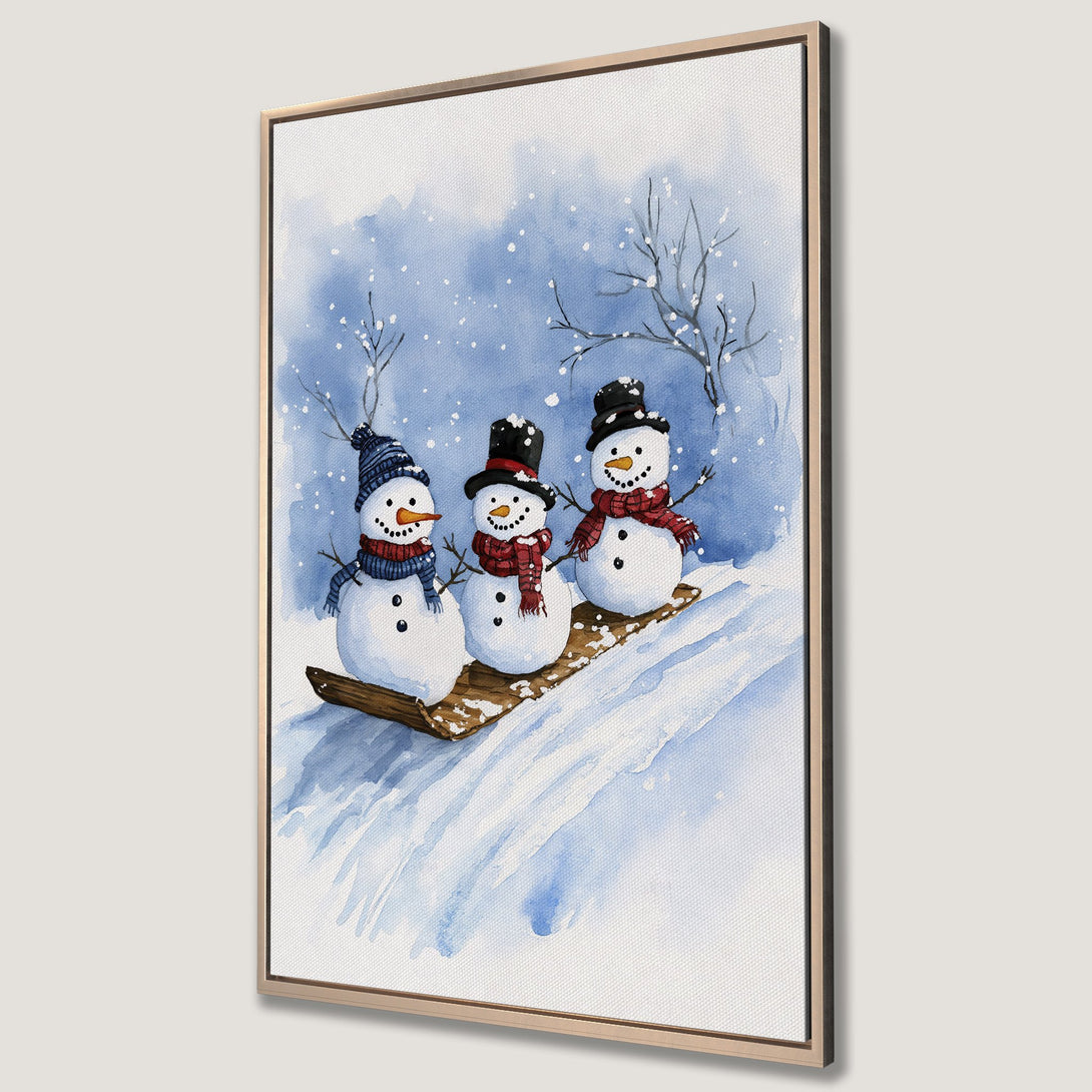 Framed Wall Art featuring a watercolor painting of three snowmen enjoying a winter scene. Blue and white color palette, perfect for holiday decor.