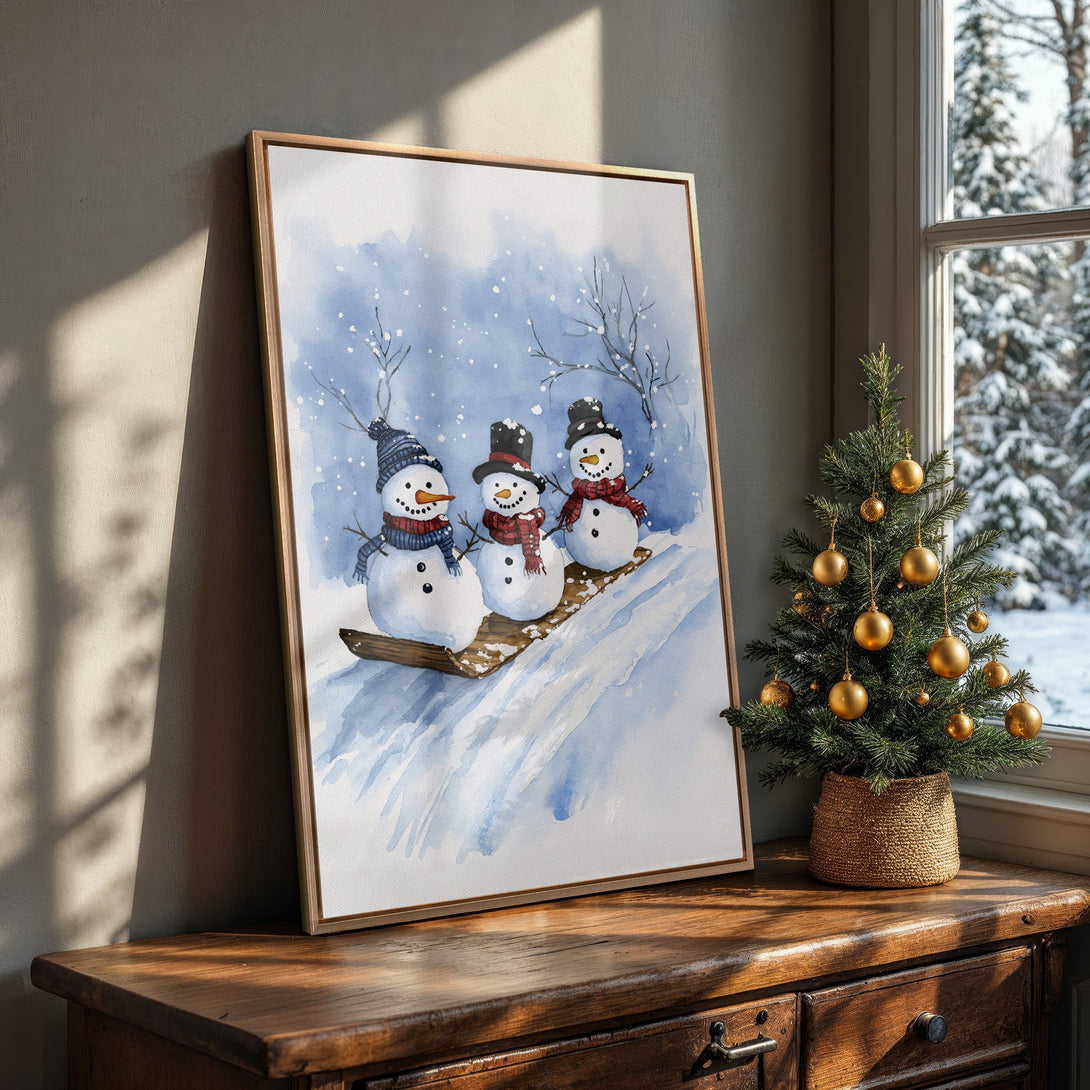 Framed Wall Art: Watercolor snowmen scene in blue and white. Cozy winter decor, perfect for holiday gifting. Add charm to your home with this canvas print!