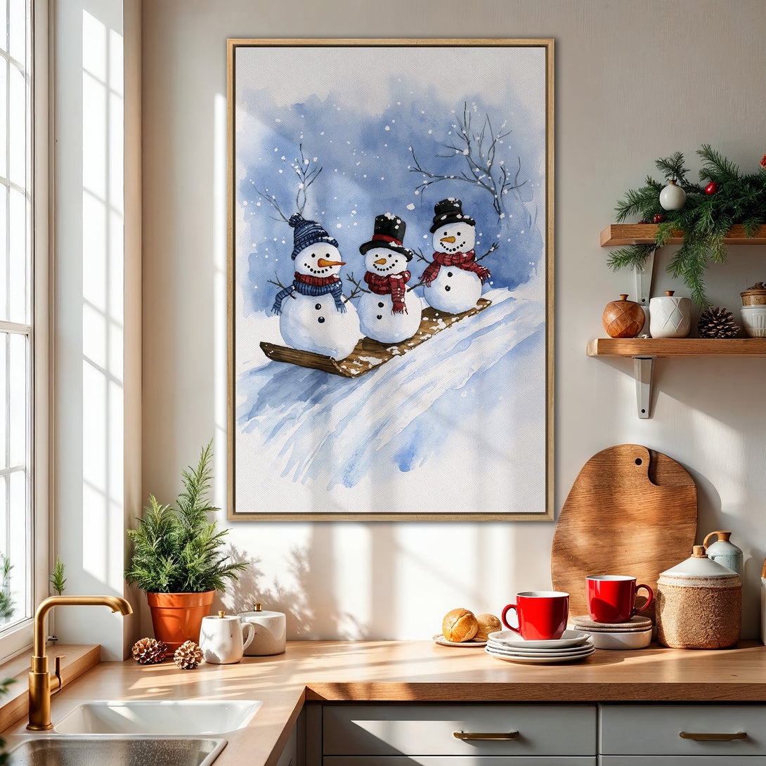 Framed Wall Art: Watercolor painting of snowmen in a winter scene. Blue, white, and red color palette. Perfect for holiday decor.