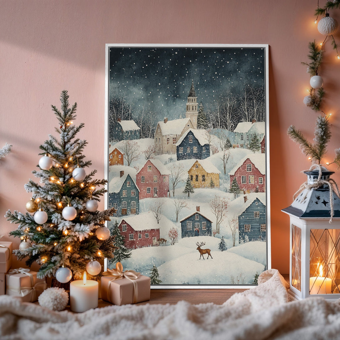 Framed Wall Art: Watercolor winter village scene with snow-covered houses in a cozy, pastel color palette. Perfect for holiday decor!