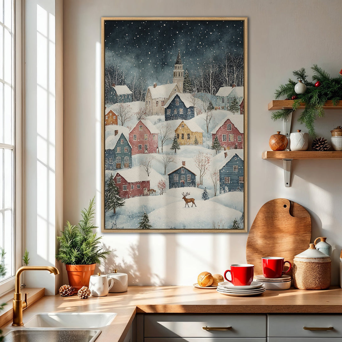 Framed Wall Art: Watercolor winter village scene with snowy rooftops, charming houses, and a soft blue and pink palette. Perfect for cozy home decor!