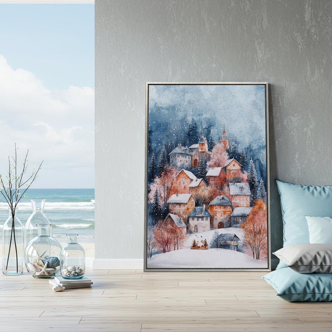 Framed Wall Art featuring a watercolor village scene with a snowy landscape, in a cozy blue and orange color palette. Perfect for home decor!