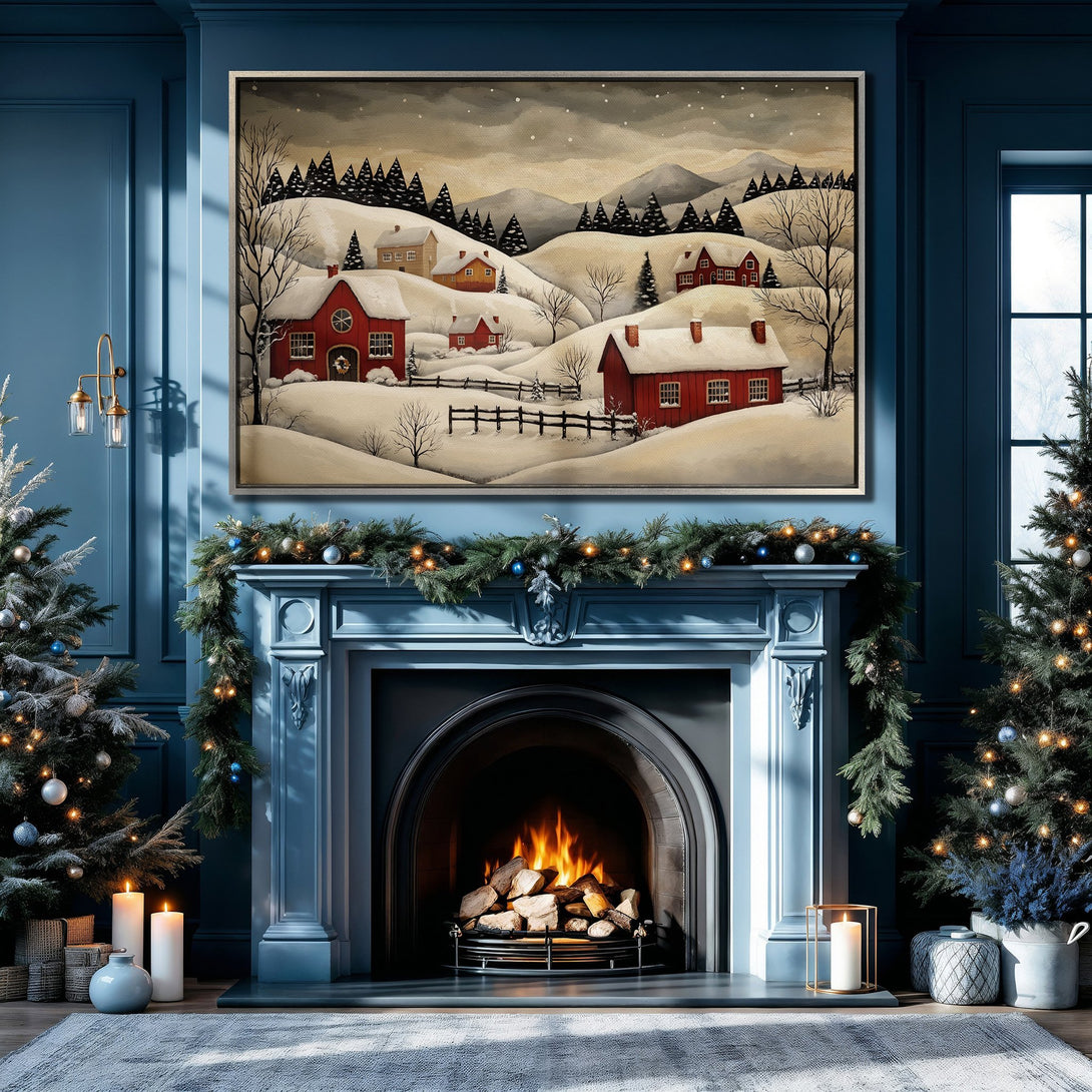 Framed Wall Art: Winter landscape Canvas Print in a cozy blue interior. Features a folk art style with red houses, snowy hills, and a warm color palette.