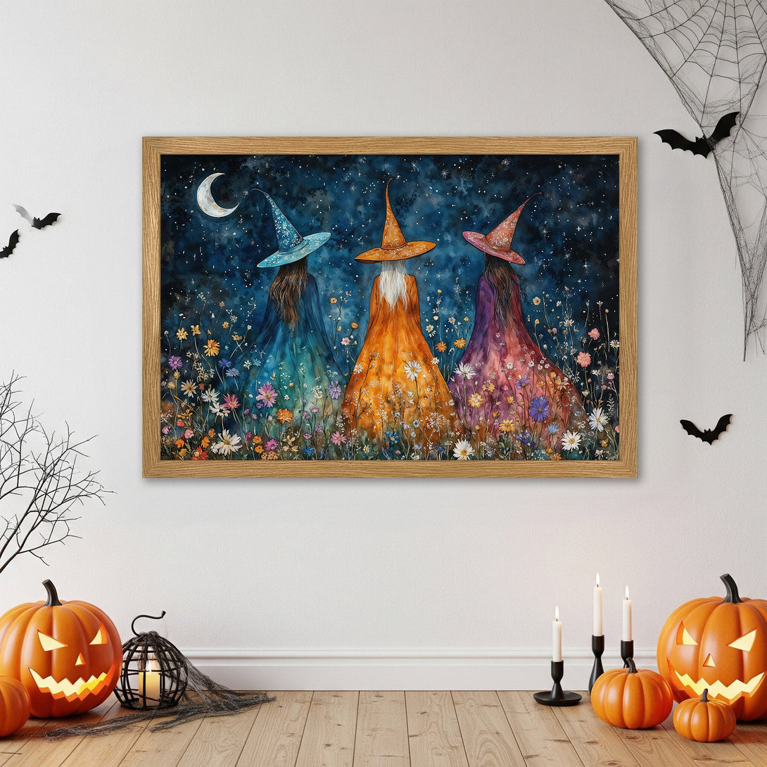 Framed Poster featuring three witches in a whimsical style, with a dark blue and colorful palette. Perfect Halloween decor!