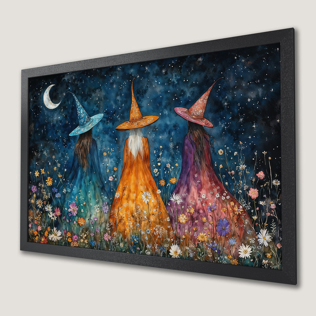 Framed Poster featuring three witches in colorful gowns, whimsical watercolor style, against a starry night sky. A magical addition to your home decor!