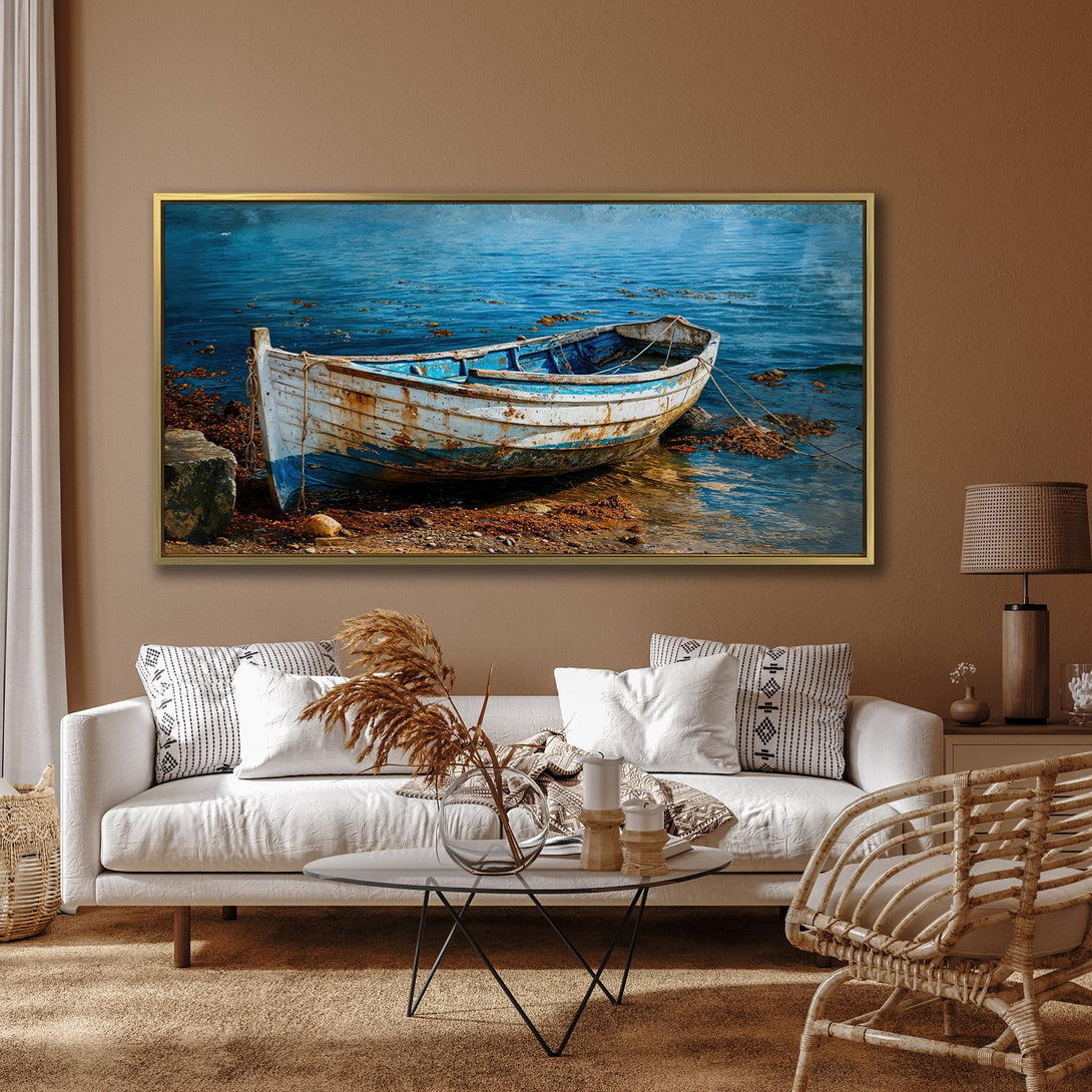 Canvas Print of a rustic boat on the shore. Coastal art in blue and white tones. Perfect for nautical decor.