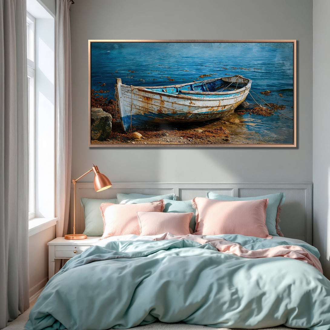 Framed Wall Art: Coastal boat scene in blue and white, perfect for bedroom decor. Serene seascape canvas print with a touch of rustic charm.