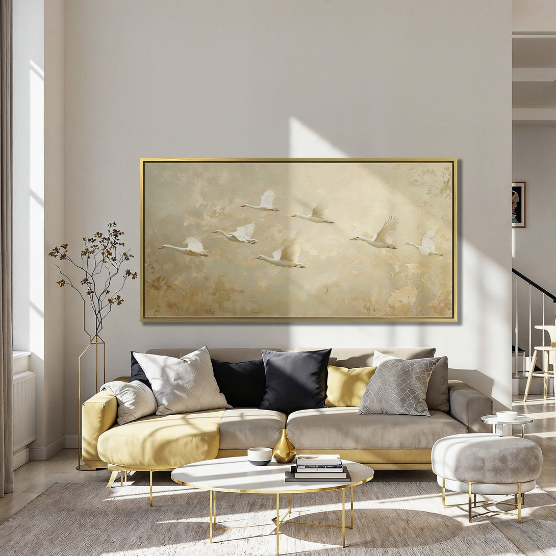 Canvas Print featuring flying swans in a vintage style, with a neutral and gold color palette. Perfect wall art for a cozy living space.