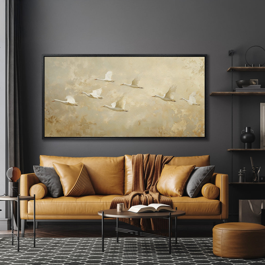 Framed Wall Art featuring elegant flying birds. Neutral color palette complements modern interior design. Elevate your space with this stunning canvas print.