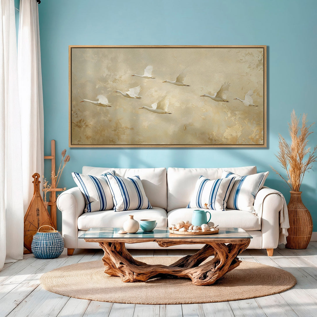 Framed Wall Art featuring flying white birds in a serene, neutral color palette. Perfect for adding a touch of nature to your home decor.