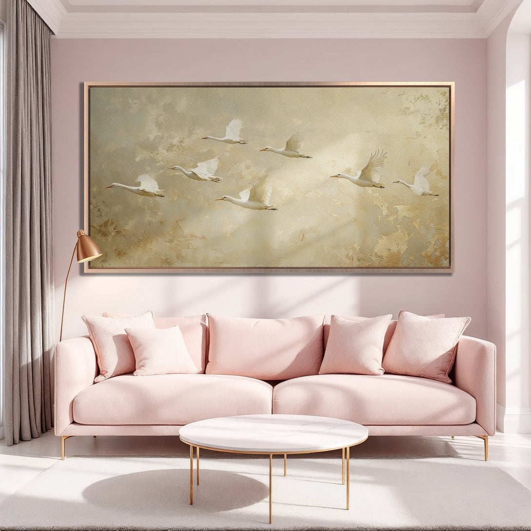 Framed Wall Art featuring elegant white swans in flight, a serene landscape painting with a warm, neutral color palette. Perfect for adding a touch of sophistication.