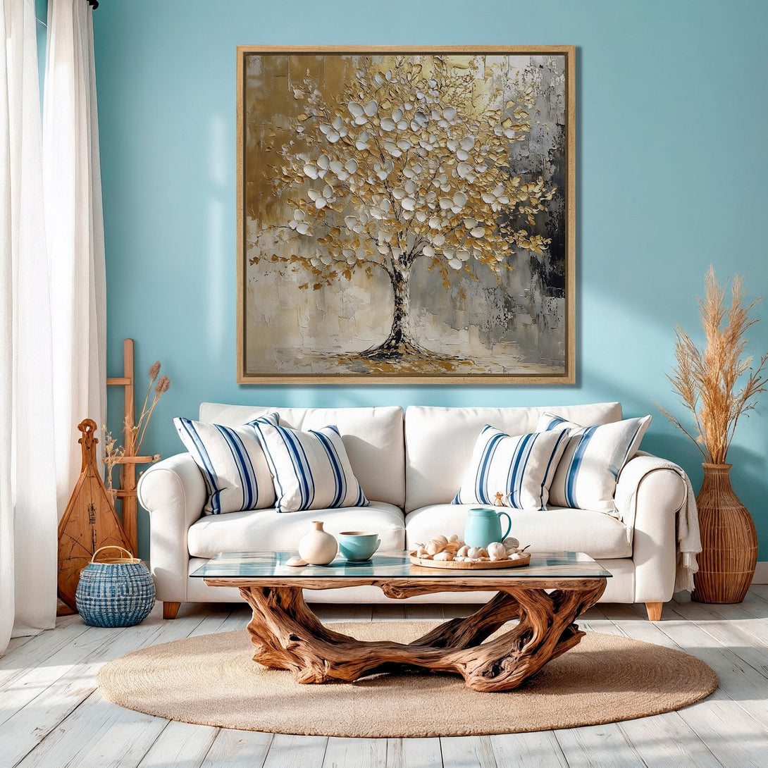 Framed Wall Art featuring an abstract gold and white tree painting. Adds a touch of elegance to any room. Stylish decor with a neutral color palette.