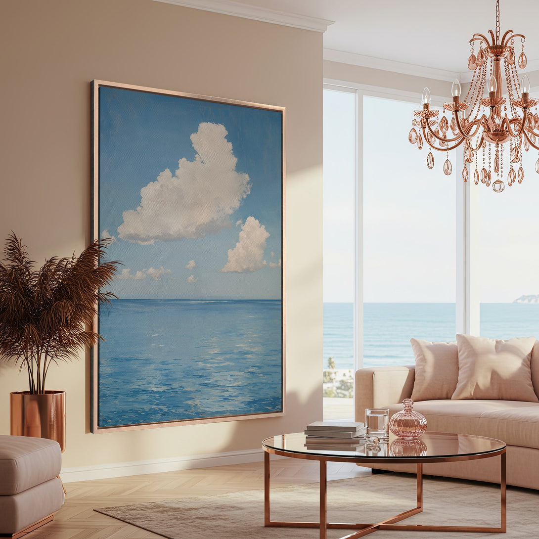 Framed Wall Art: Serene seascape Canvas Print in blue and white, displayed in a modern interior with a warm, neutral color palette. Elevate your space!