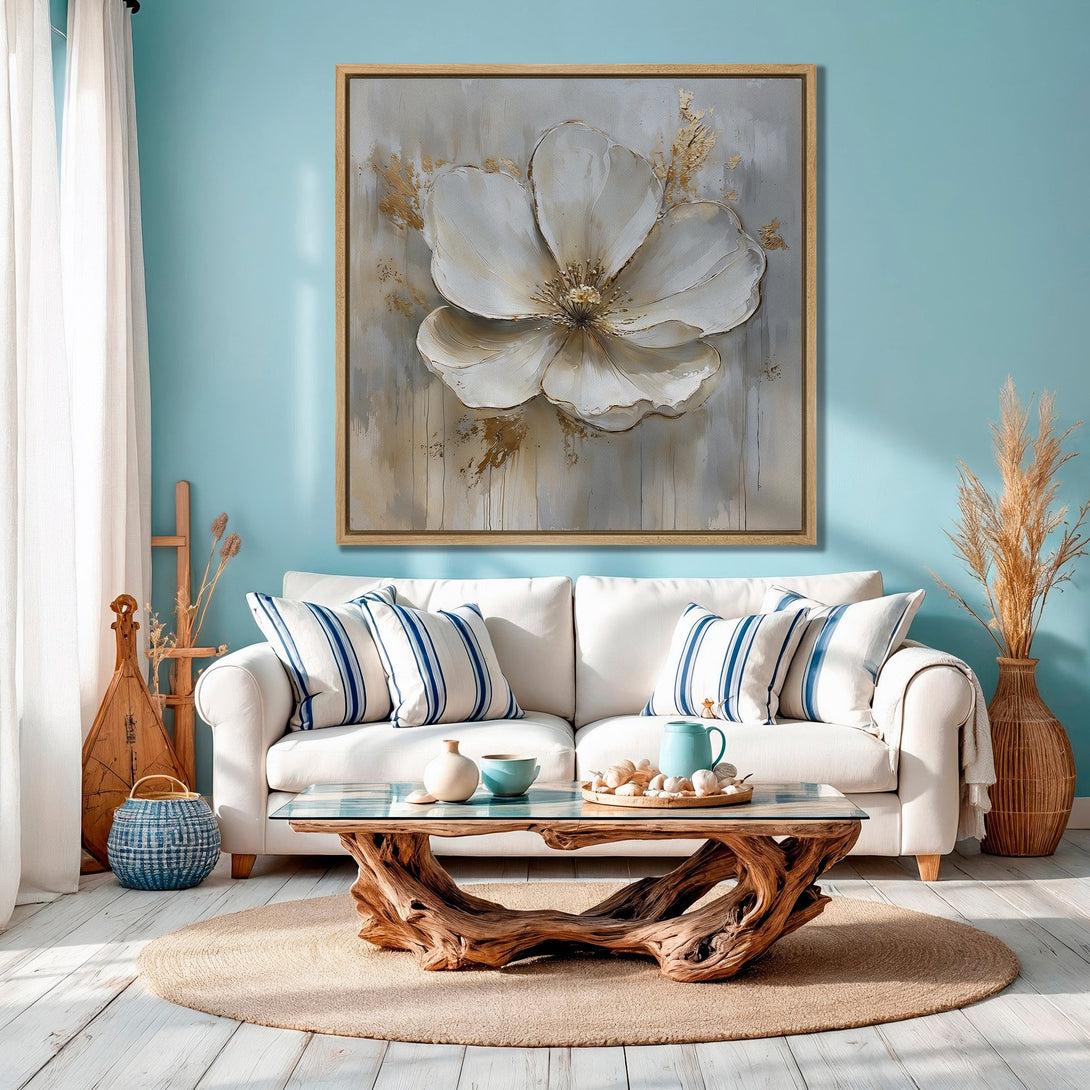 Framed Wall Art: Stunning white flower canvas print with gold accents. Coastal-inspired interior, featuring a calming blue and neutral color palette. Perfect for any space!