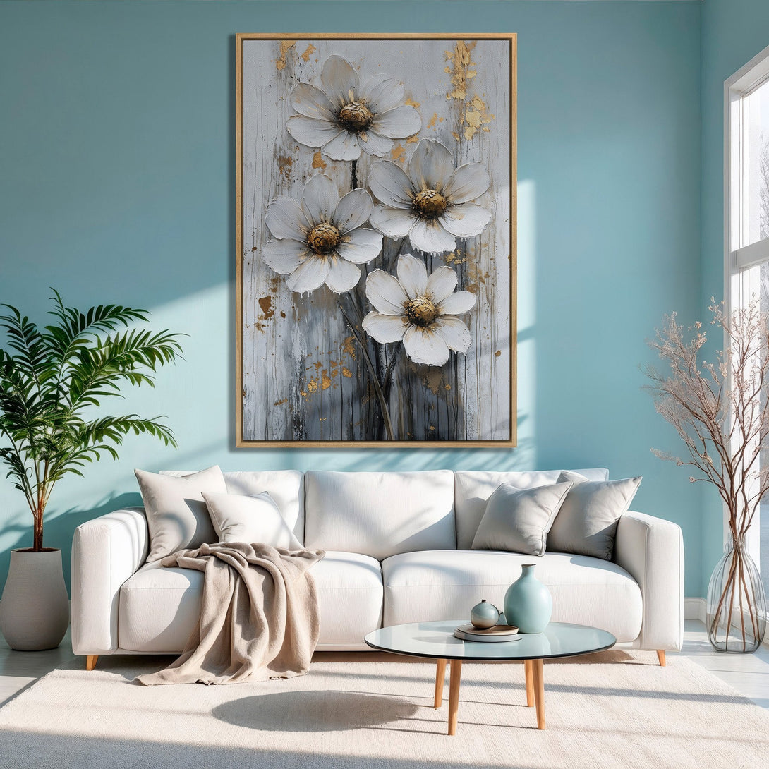 Framed Wall Art: White flower canvas print with gold accents, displayed in a modern living room with a soft, neutral color palette. Elevate your space!
