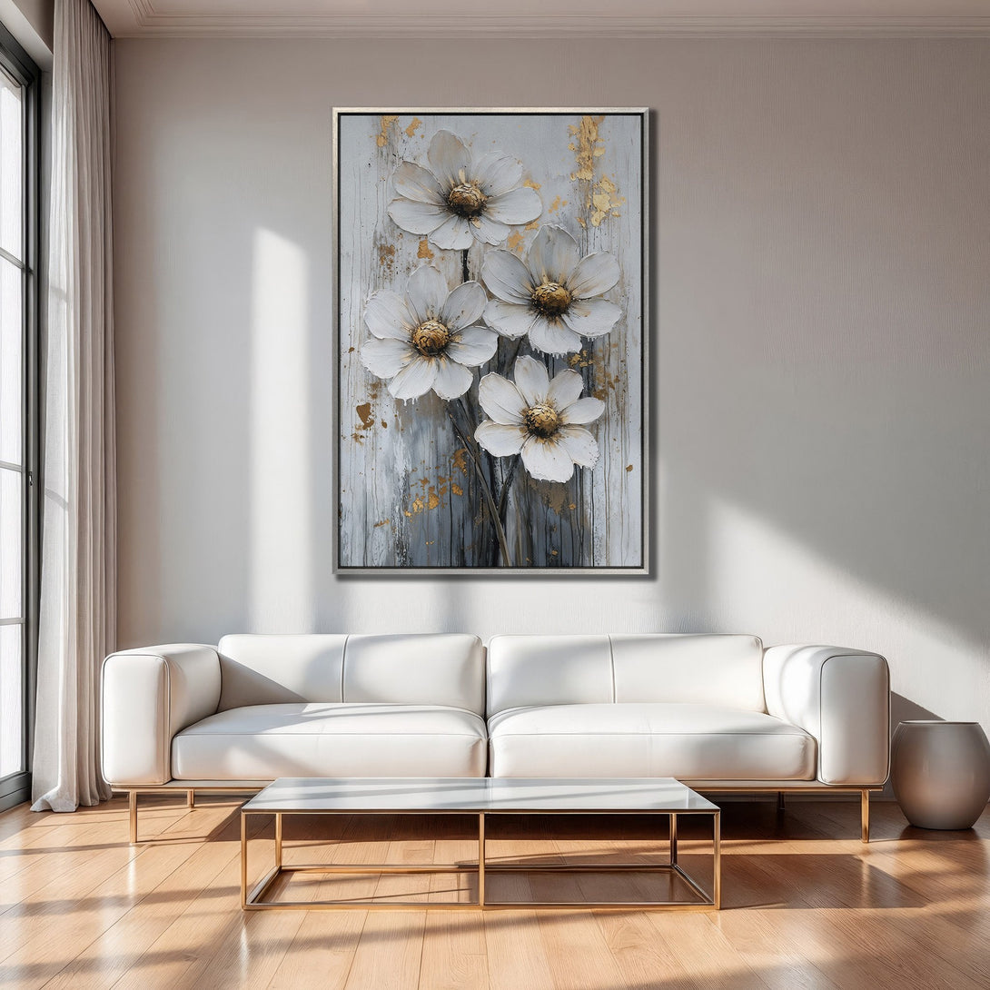 Framed Wall Art: Elegant white floral painting with gold accents in a modern living room. Neutral color palette perfect for home decor.
