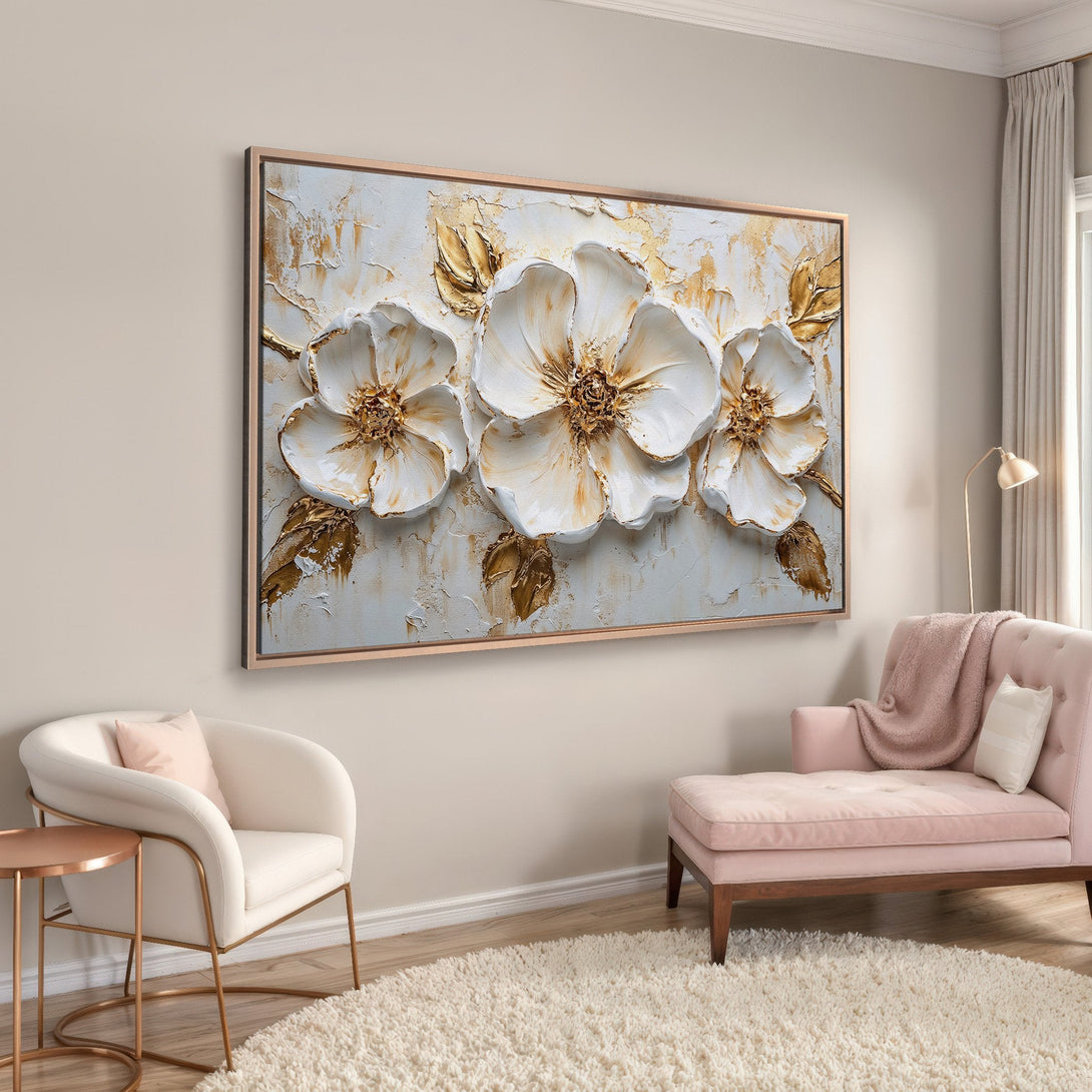 Framed Wall Art: Textured floral canvas print in white and gold, displayed in a modern interior with a soft, neutral color palette.