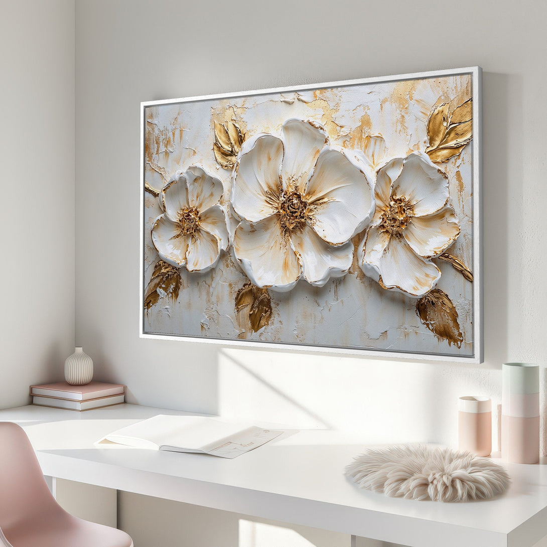 Framed Wall Art: Elegant floral canvas print in white and gold. Perfect for adding a touch of luxury to any room. Modern, textured art.