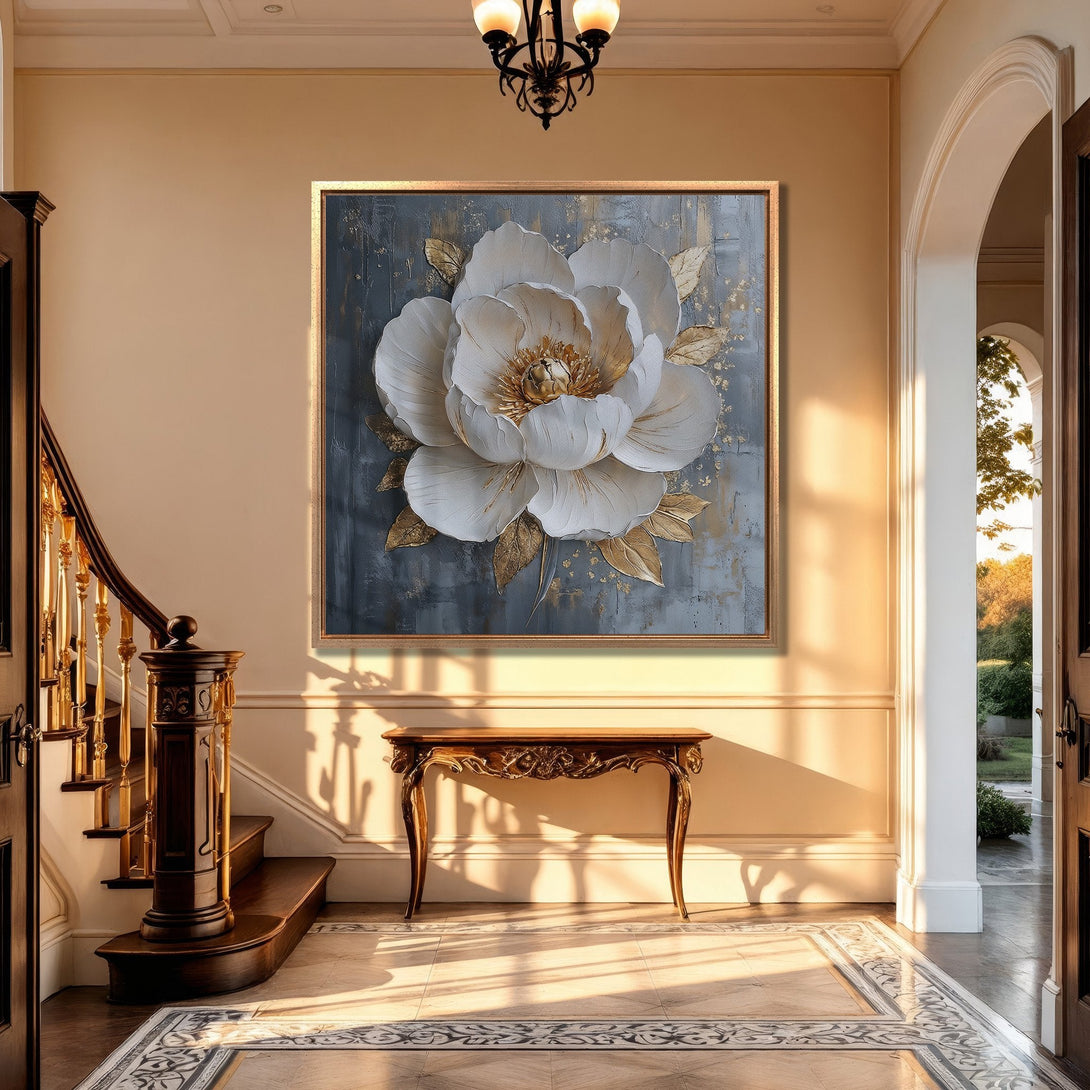 Framed Wall Art: Elegant floral canvas print in a luxury interior. White flower with gold accents on a gray background. Neutral color palette.