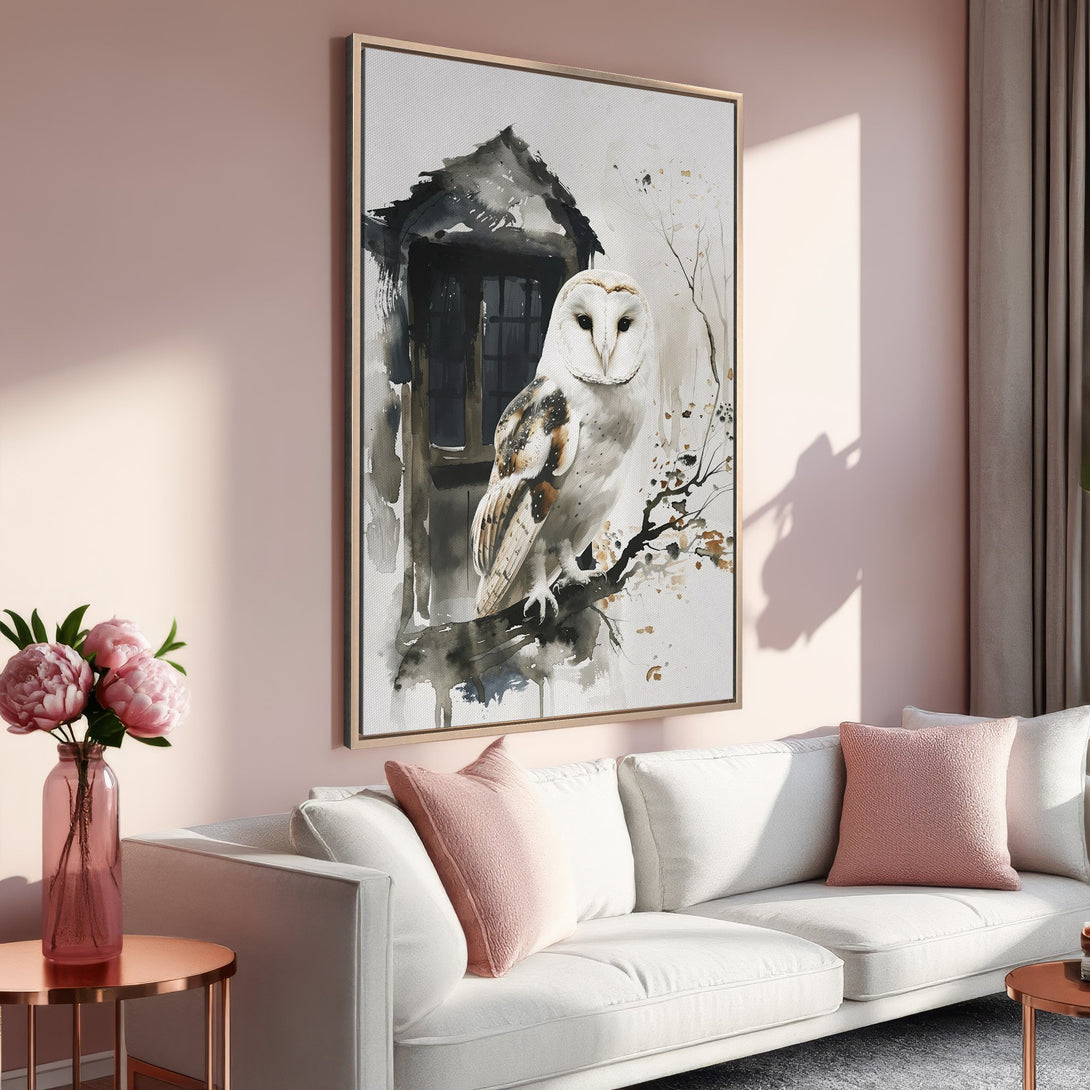 Framed Wall Art: Watercolor owl print in neutral and blush tones. Perfect for adding a touch of nature and elegance to your living room decor.