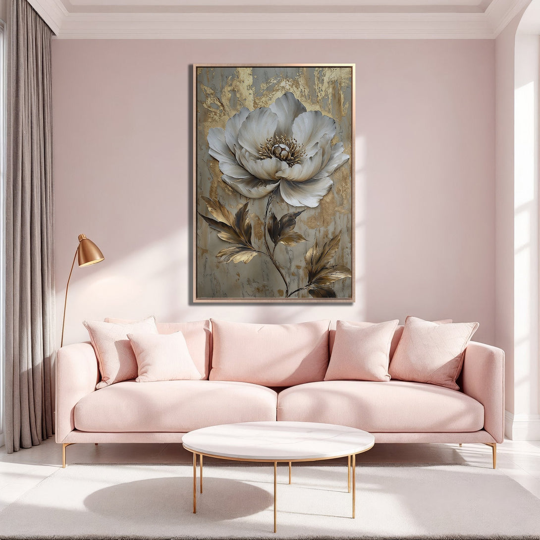 Framed Wall Art: Elegant floral canvas print with gold accents in a modern interior. Features a white flower on a gold and gray background, perfect for any room.