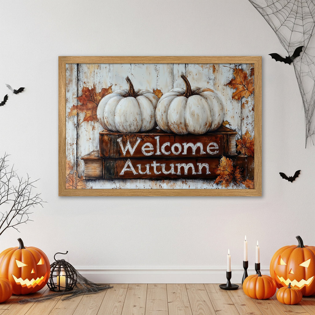 Framed Poster featuring pumpkins, leaves, and "Welcome Autumn" in rustic style, warm orange and white color palette. Perfect fall decor.