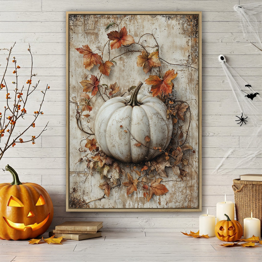 Framed Wall Art featuring a white pumpkin with autumn leaves. Rustic style, warm neutral color palette. Perfect fall decor for your home.