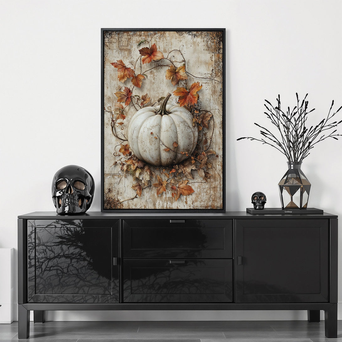 Framed Wall Art featuring a white pumpkin with autumn leaves. Rustic style, warm neutral color palette. Perfect fall home decor accent.