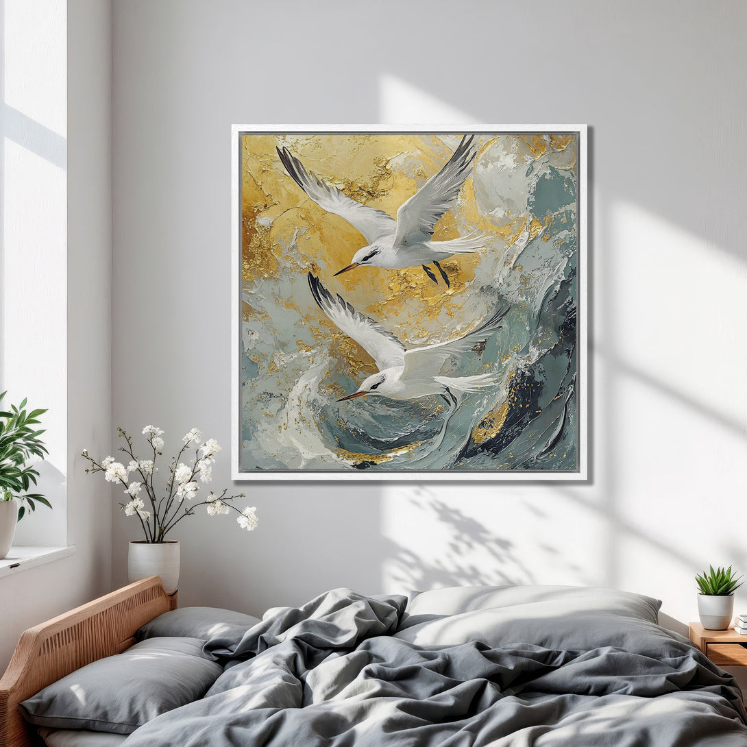 Framed Wall Art: Abstract painting of seagulls in flight with a gold, teal, and gray color palette. Modern art for bedroom decor.