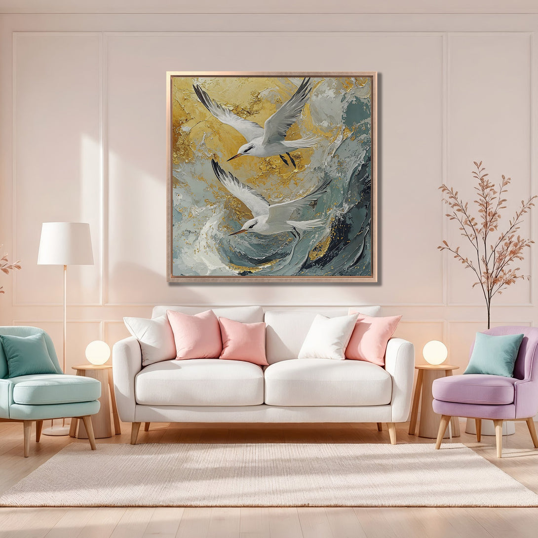Framed Wall Art featuring a coastal-inspired painting of seagulls in flight, with a gold, teal, and white color palette. Perfect for adding a touch of serenity to any space.