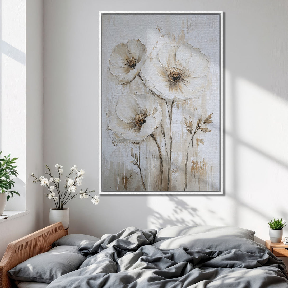 Framed Wall Art: Elegant floral canvas print in neutral tones. Perfect for bedroom decor. Features white flowers and a soft, warm color palette.
