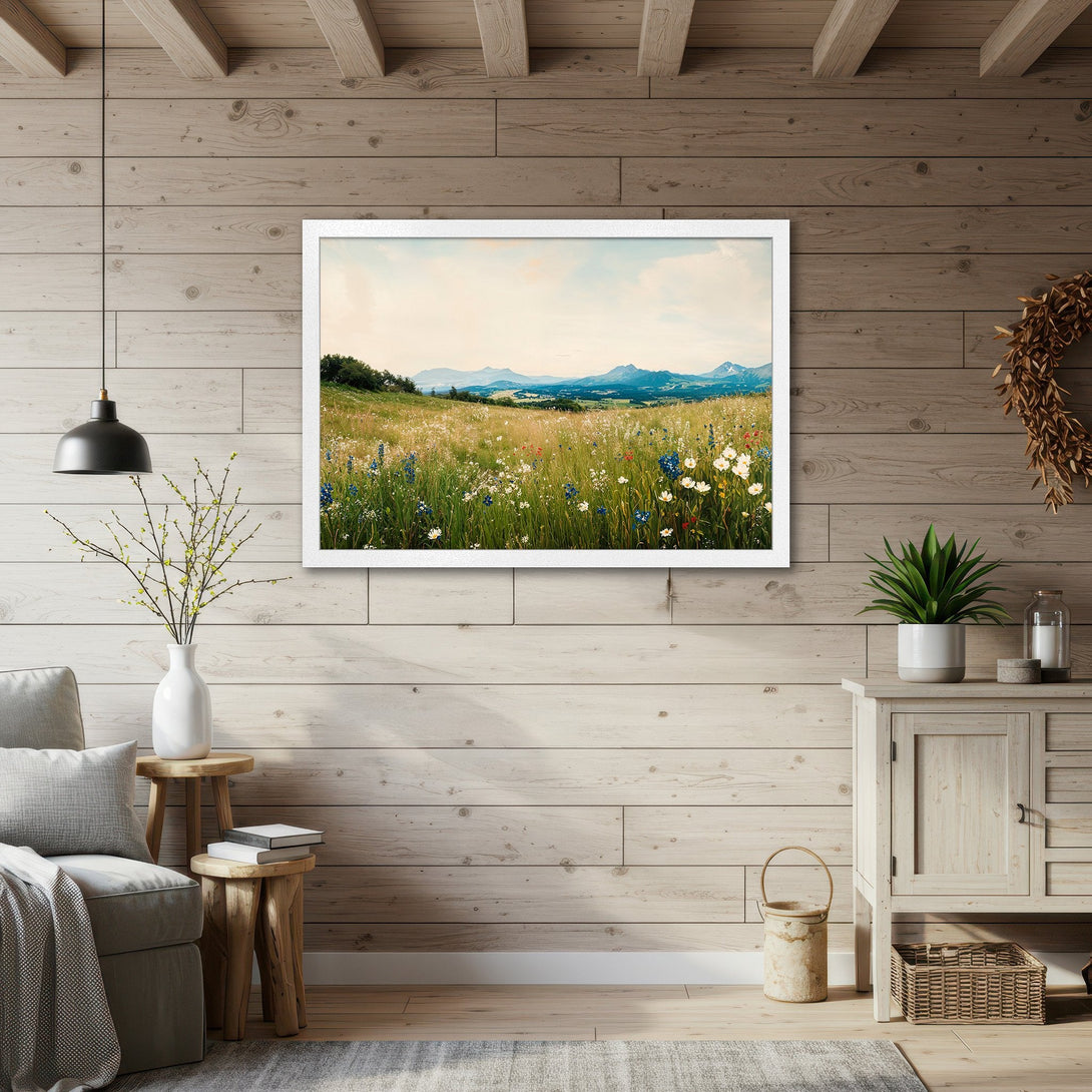 Framed Poster featuring a serene landscape with wildflowers and mountains, in a rustic style with a soft, natural color palette.