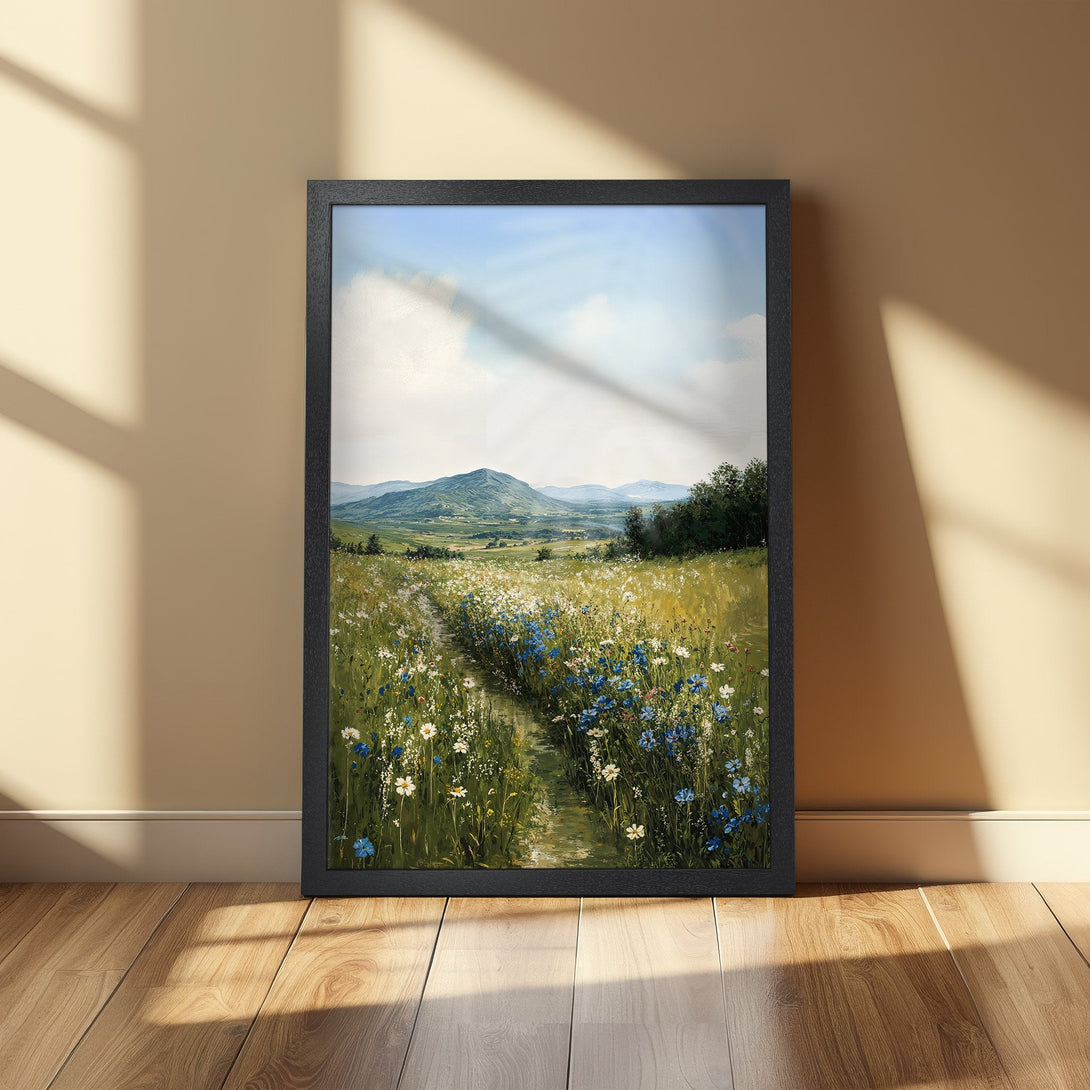 Framed Poster of a serene landscape with wildflowers, mountains, and a blue sky. Earthy tones and vibrant blues create a calming aesthetic.