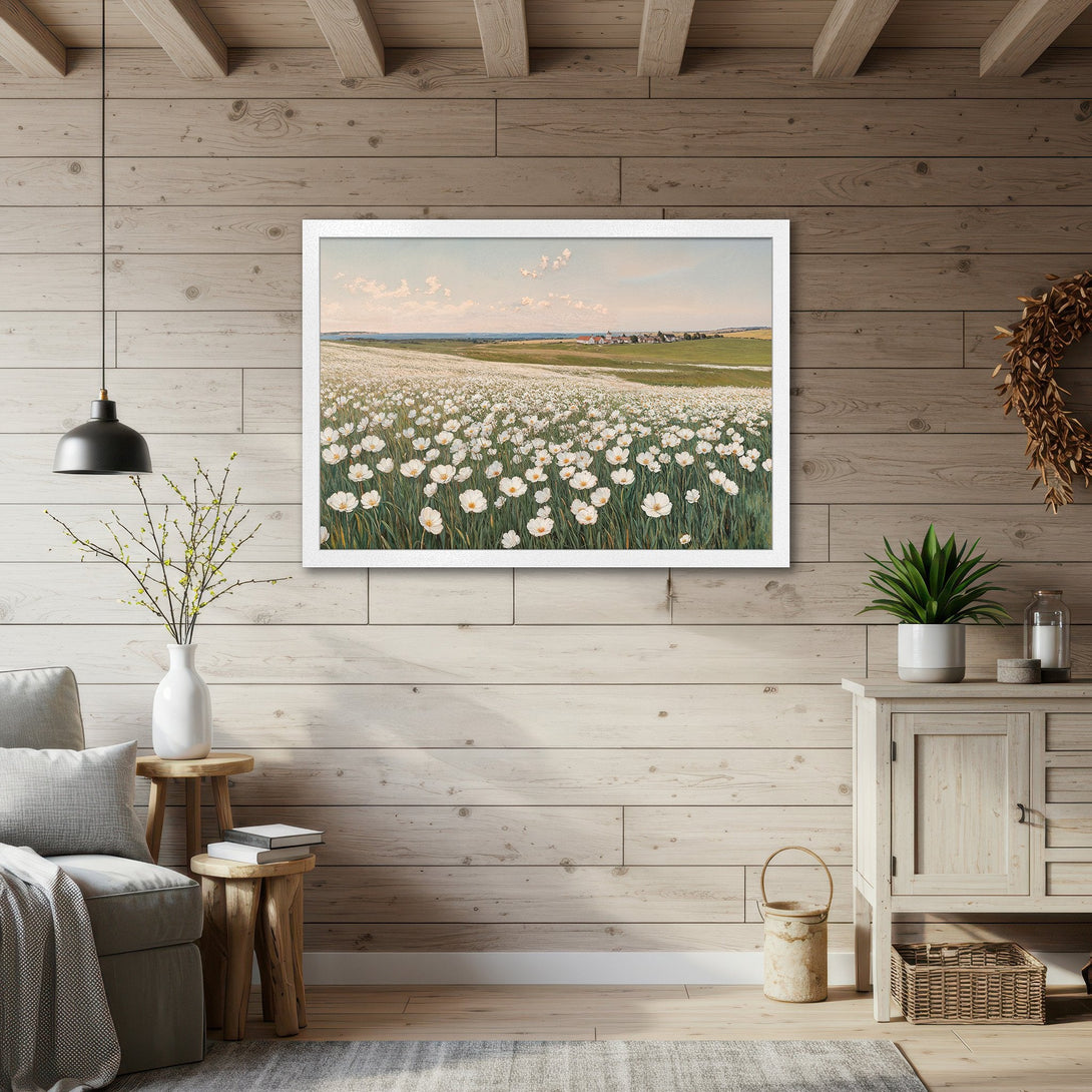 Framed Poster featuring a field of white flowers. Rustic style, soft pastel color palette. Perfect wall art for a calming space.