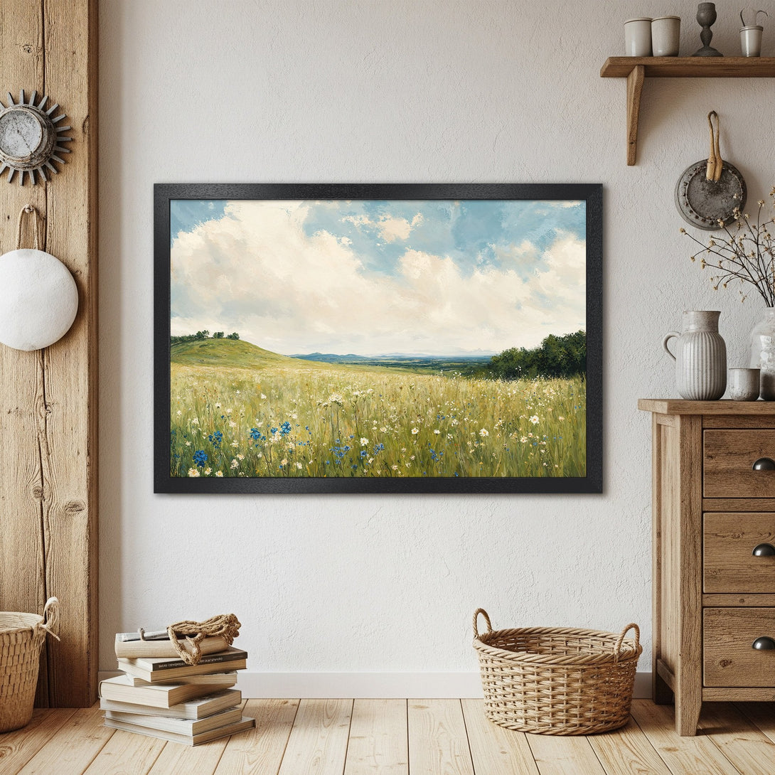 Framed Poster of a serene landscape painting. Features a field of wildflowers under a blue sky, in a soft, muted color palette.