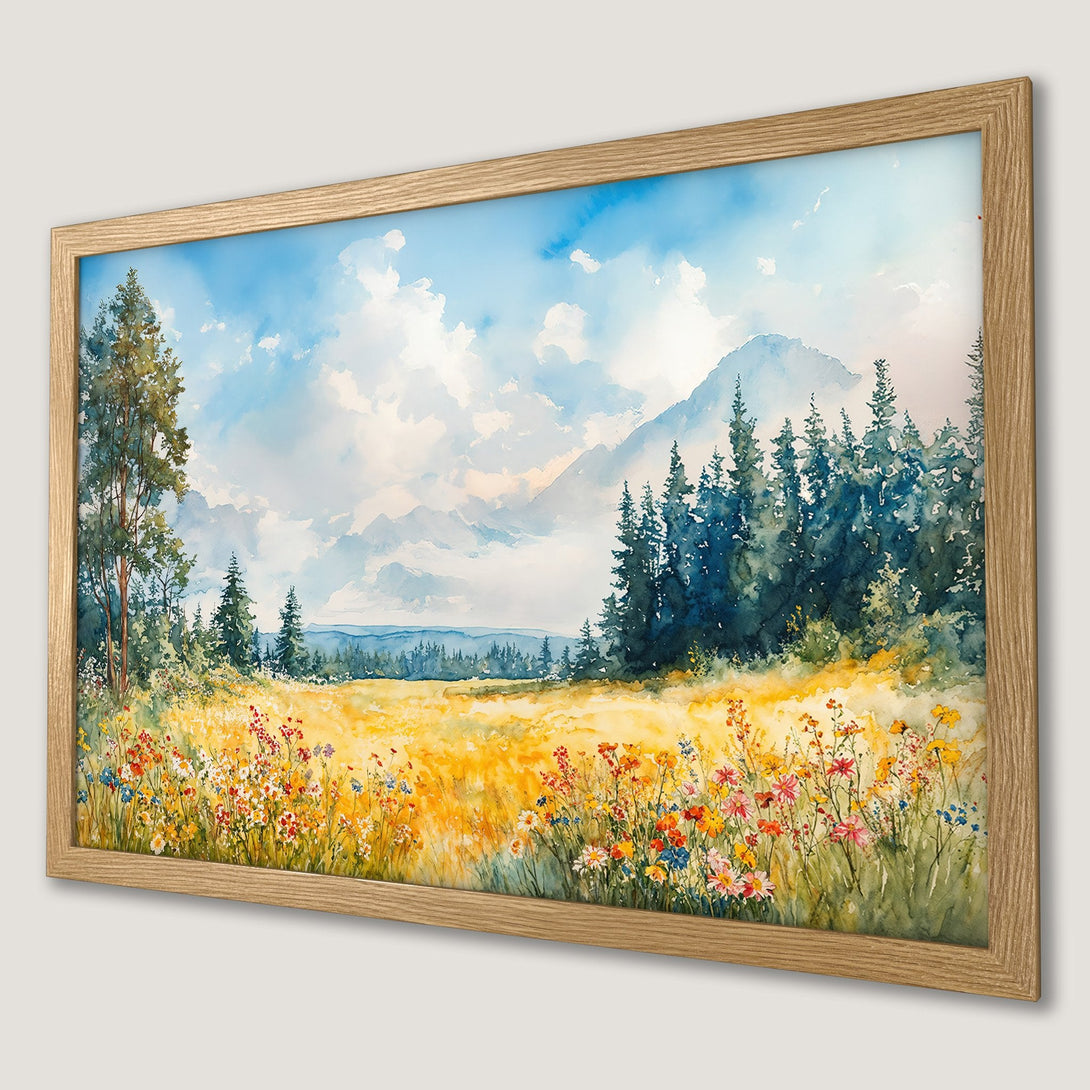 Framed Poster of a watercolor landscape featuring a field of wildflowers, mountains, and trees. Soft blues, greens, and yellows. Perfect wall art!