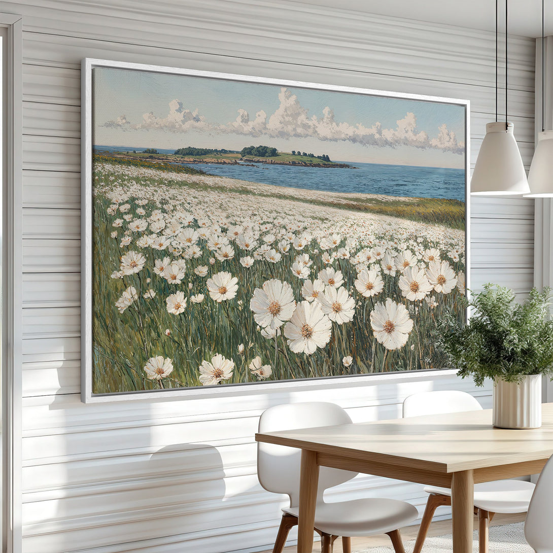 Framed Wall Art Canvas Print of a serene coastal landscape with white flowers, blue water, and a soft, inviting color palette. Perfect for any room!